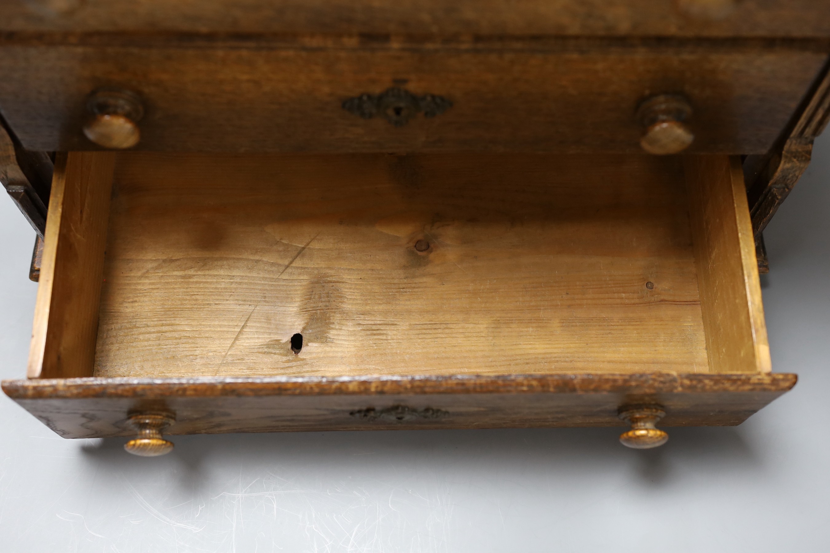 An oak table top chest of three drawers, 39.5cm wide